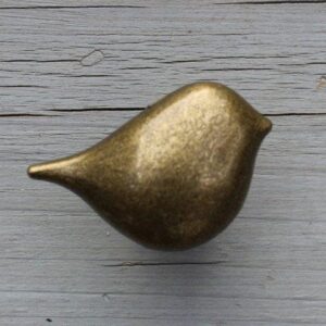 "Golden bird-shaped customized door handle with intricate details and a unique design."